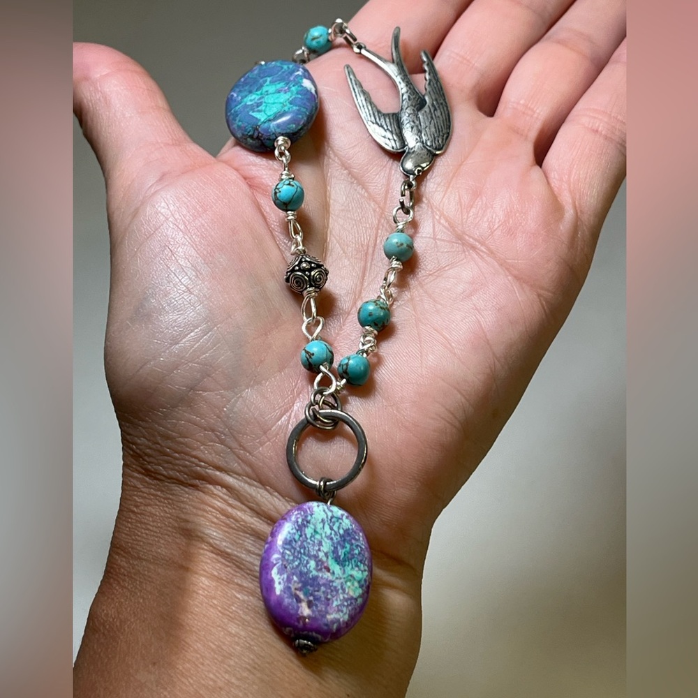 Handmade silver necklace with a bird, purple and turquoise beads - Picture 7 of 8